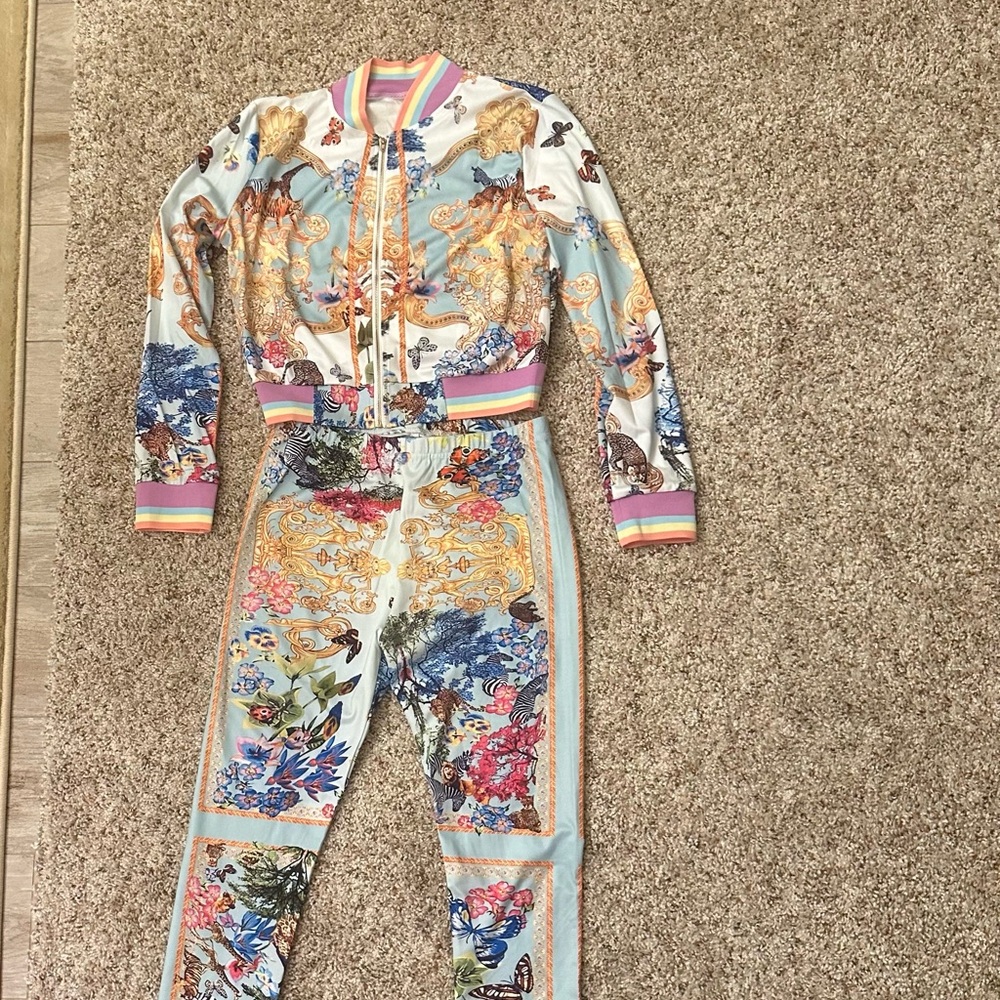 New matching jacket, pants size small animal print